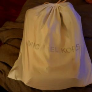 3 Michael Kors bags